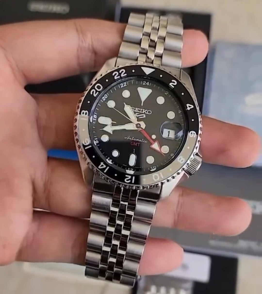 Seiko 5 GMT stainless steel Black Dial black Bezel watch